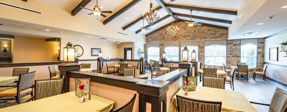Interior view of a dining area with tables and chairs
