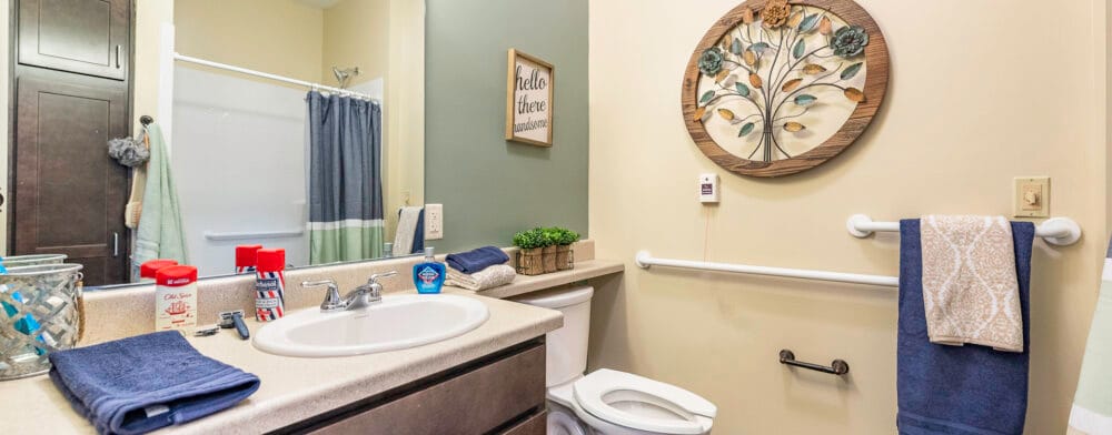 Bright and clean bathroom with floral decor