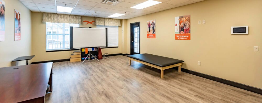 Bright interior space with wooden flooring and seating