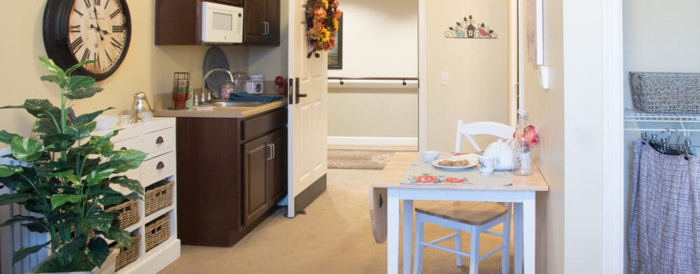Cozy interior of a resident room with kitchen area
