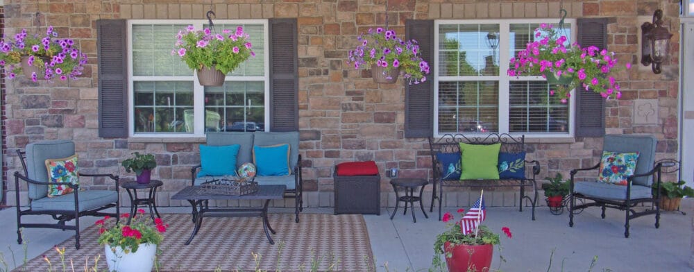 Outdoor seating area adorned with flowers