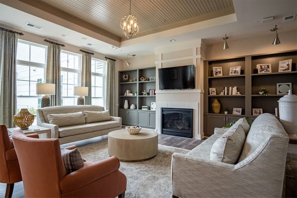 Bright common area with cozy furniture and decor