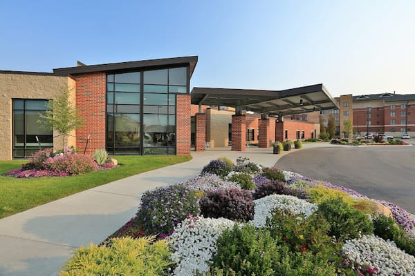 Exterior view of Chelsea Retirement Community with landscaping