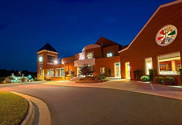 Exterior view of the Abernethy Laurels building at night
