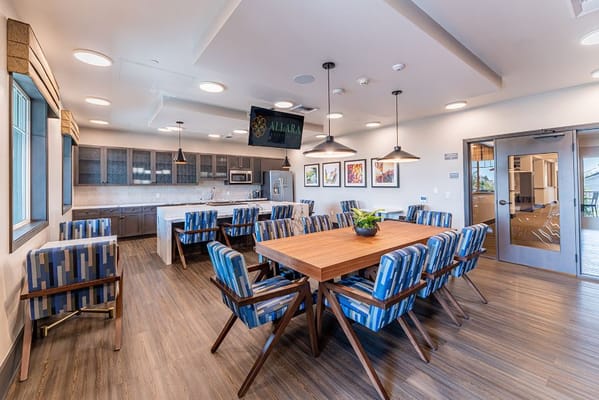 Bright dining room with modern furniture and artwork