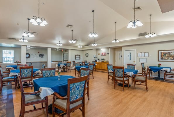 Dining room with tables set for meals