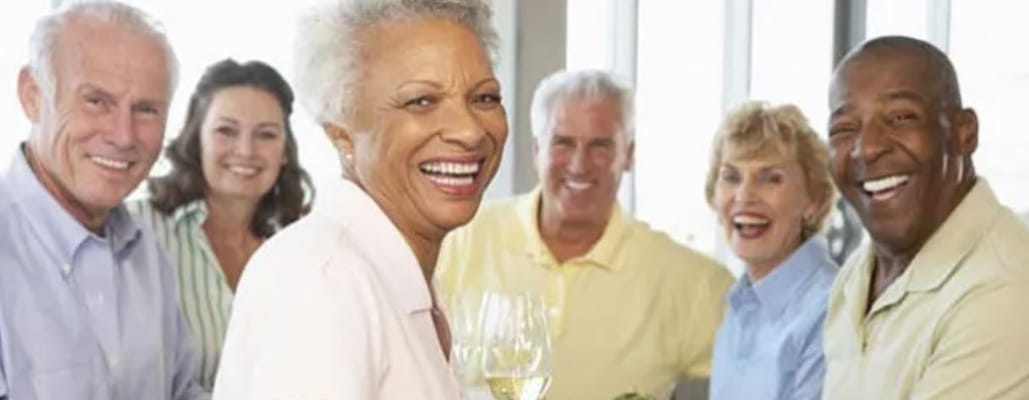 Residents enjoying a joyful gathering with drinks
