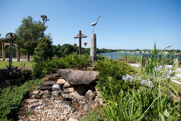 Garden area with water feature and sculpture