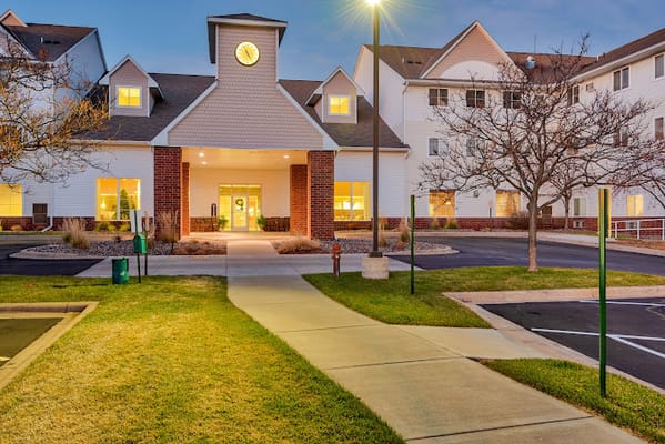 Exterior view of Amira Choice Champlin building at twilight