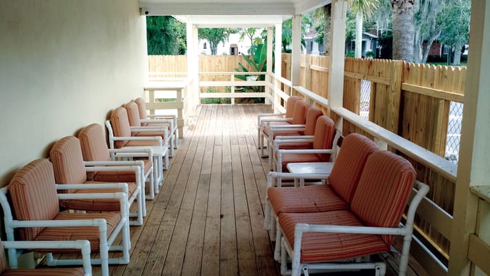Covered outdoor area with seating for residents