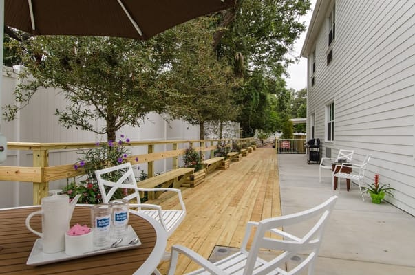 Outdoor seating area with snacks and drinks.