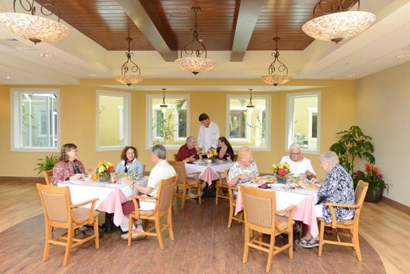 Residents enjoying a meal in the dining room