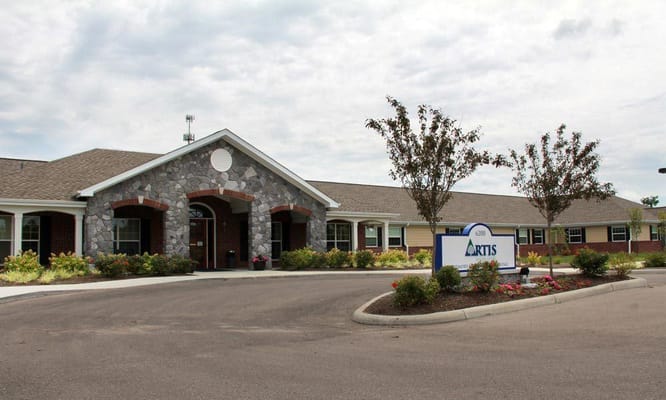 Exterior view of Artis Senior Living facility entrance
