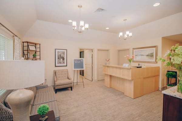 Reception area in a bright, inviting senior living facility