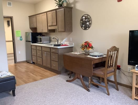 Interior view of a resident room with kitchenette