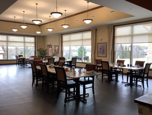 Dining room area with tables and chairs