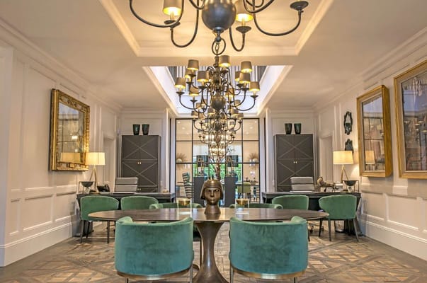 Elegant common area with chandeliers and modern decor