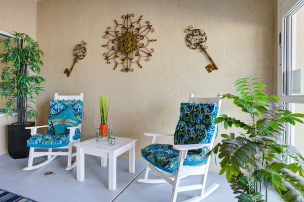 Bright and inviting lounge area with chairs and plants