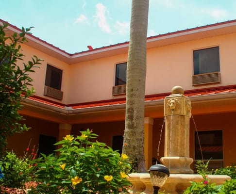 Fountain and landscaping in a courtyard setting