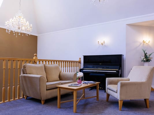 Comfortable seating area with a piano