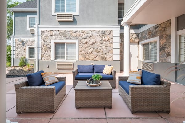Outdoor seating area with comfortable couches