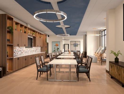 Bright dining area with modern decor and seating