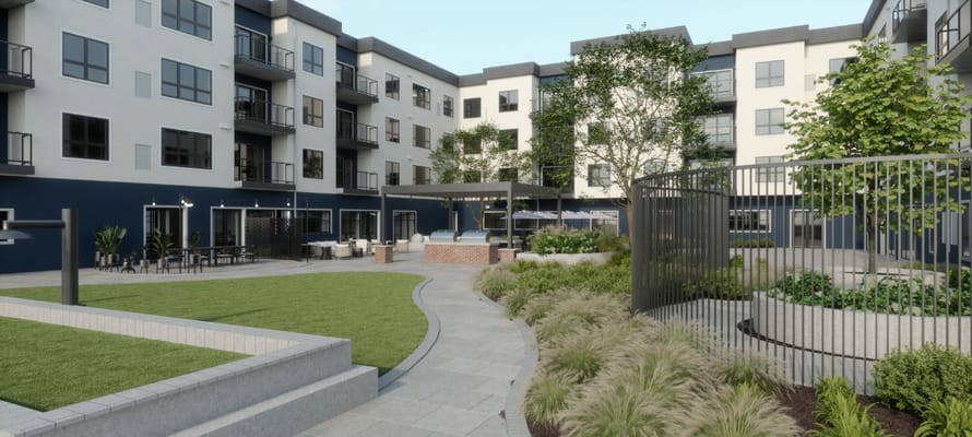 Courtyard area of a senior living facility with greenery