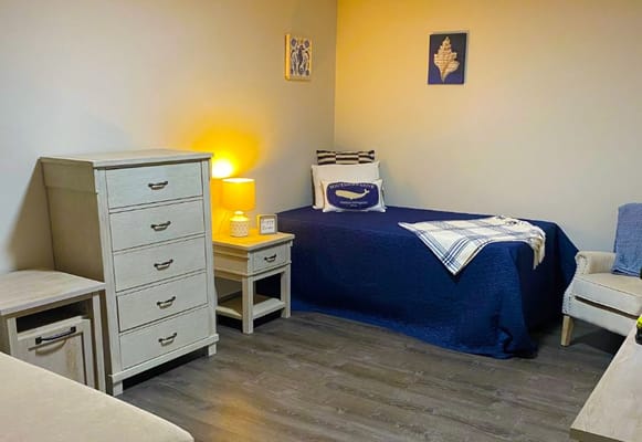 Cozy interior view of a resident room with furniture