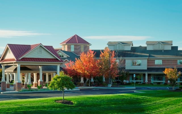 Exterior view of Bethany Village with autumn trees