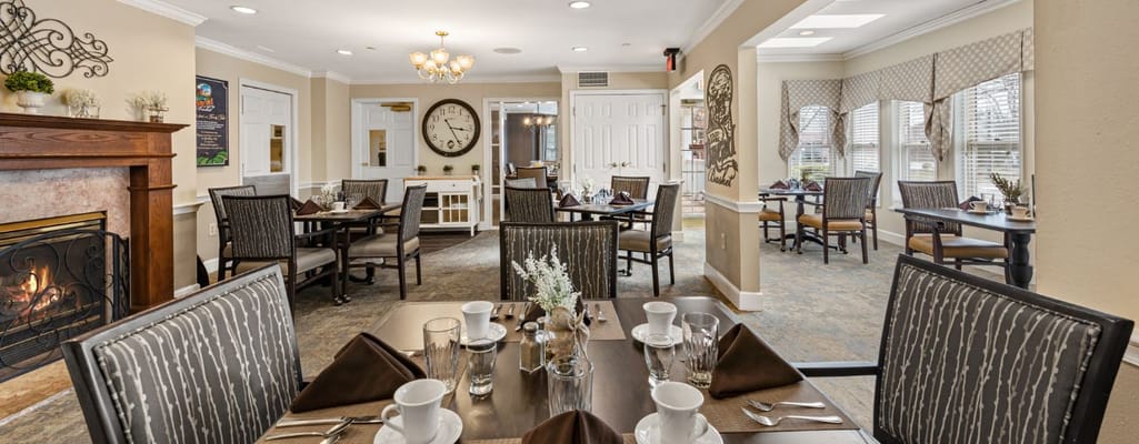 Dining area set for a meal in a cozy interior