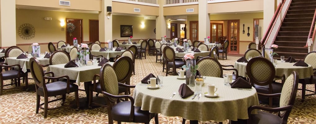 Dining area setup with tables and chairs