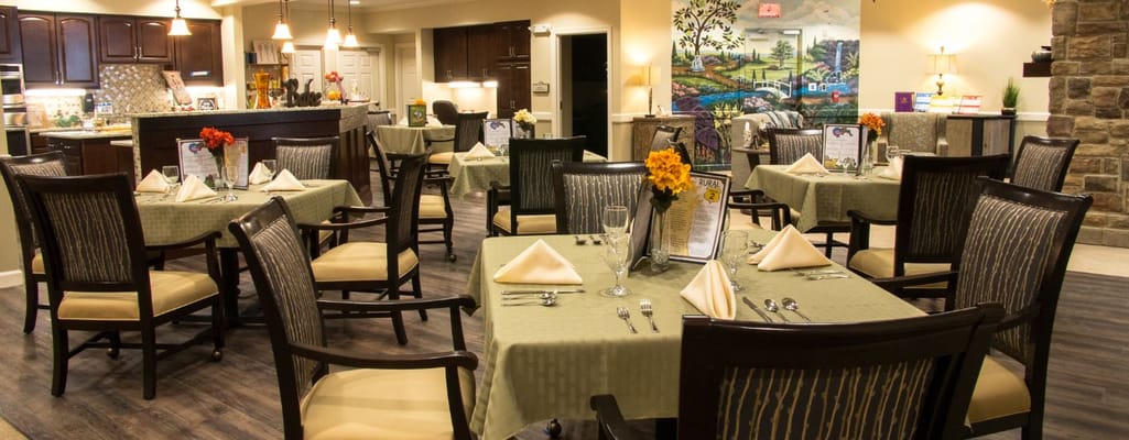 Elegant dining room setup with tables and chairs