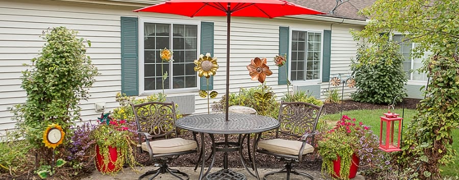 Outdoor seating area with flowers and decorations