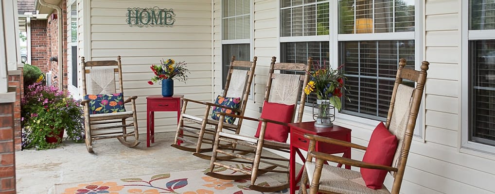 Rocking chairs and flowers on a welcoming porch