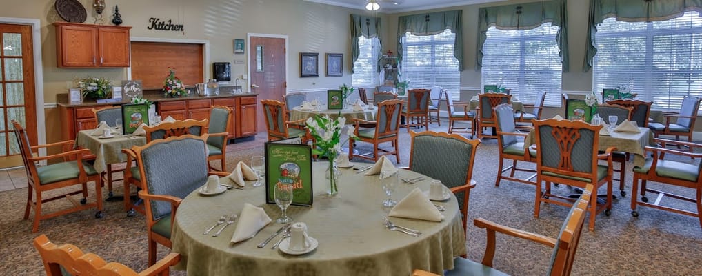 Dining area featuring tables set for a meal in Bickford of Crawfordsville.