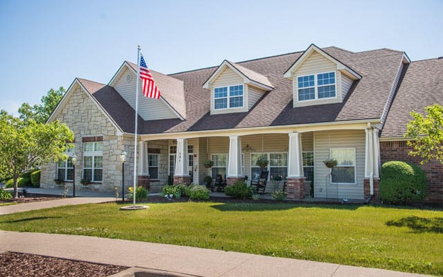 Exterior view of the Bickford of Marshalltown facility with flag