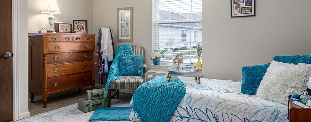 Cozy resident room with personal decor and natural light