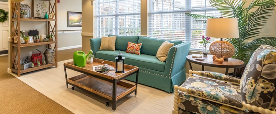 Bright common area with comfortable seating and decor