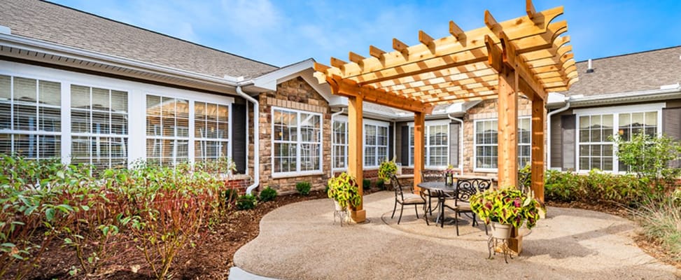 Outdoor patio with seating and landscaping