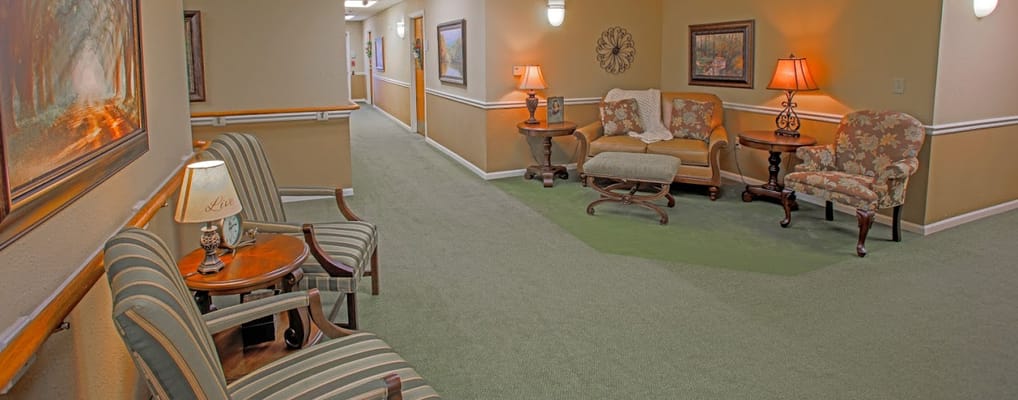 Bright common area with seating and artwork