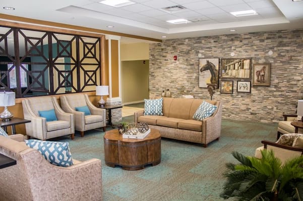 Common area in an assisted living facility with comfortable seating