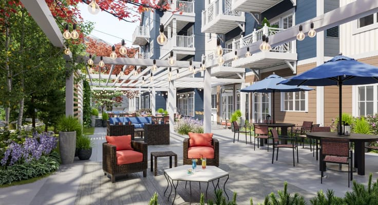 Outdoor patio area with seating and plants