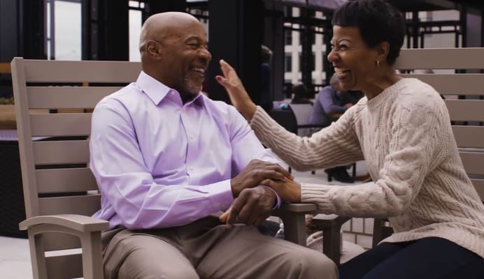 Two residents enjoying each other's company outdoors