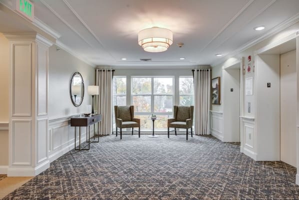 Bright, inviting interior common area with seating