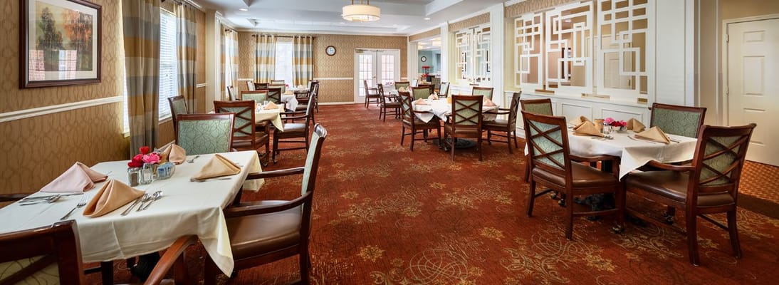 Well-set dining room with neatly arranged tables