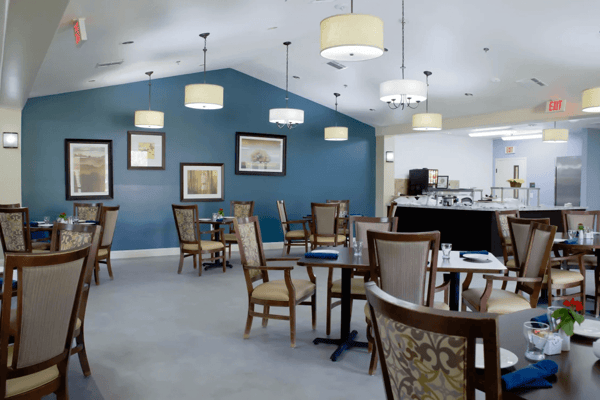 Bright dining room with tables and chairs