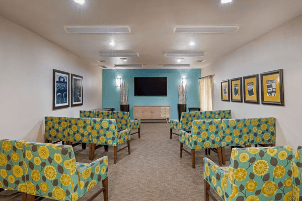 Bright common area with colorful seating