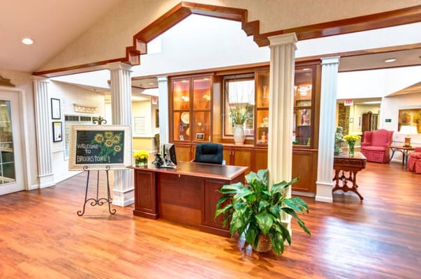 Lobby area with reception desk and decorative elements