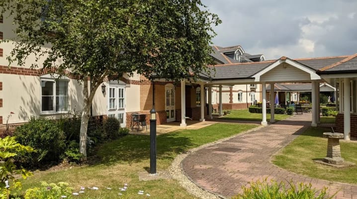 Outdoor pathway and seating area in retirement village