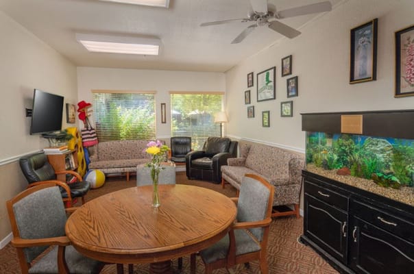 Interior common area with seating and an aquarium